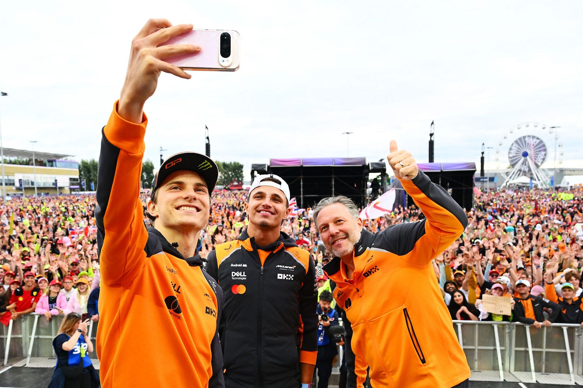 Second placed Oscar Piastri of Australia and McLaren, Race winner Lando Norris of Great Britain and McLaren and Zak Brown, Chief Executive Officer of McLaren - Source: Getty Images